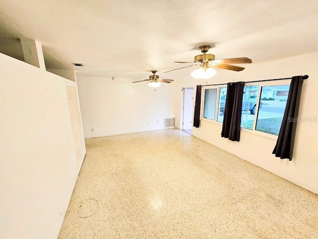 empty room featuring ceiling fan