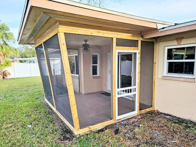 entrance to property with a yard