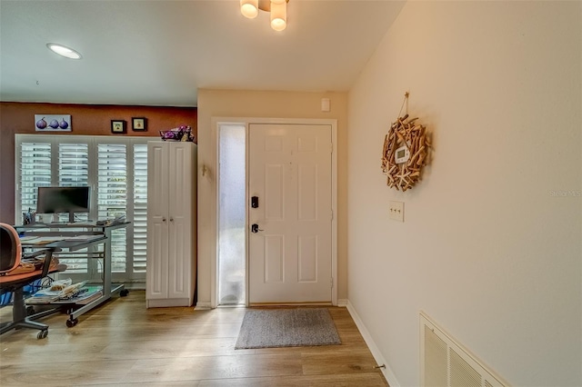 entryway with light wood-type flooring