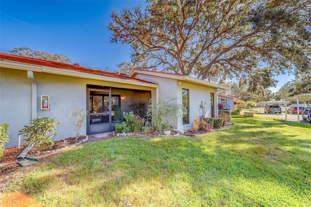 exterior space with a front lawn