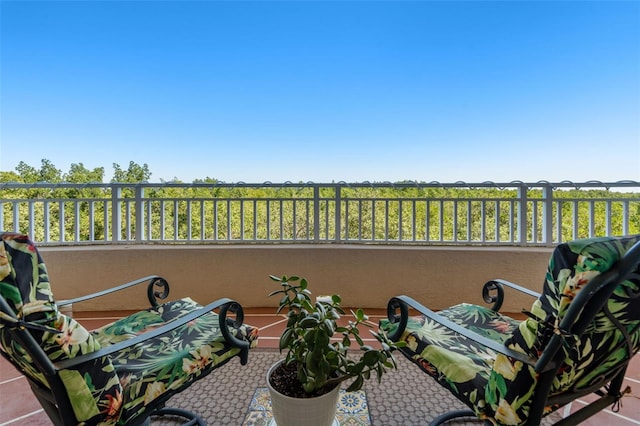 view of patio with a balcony