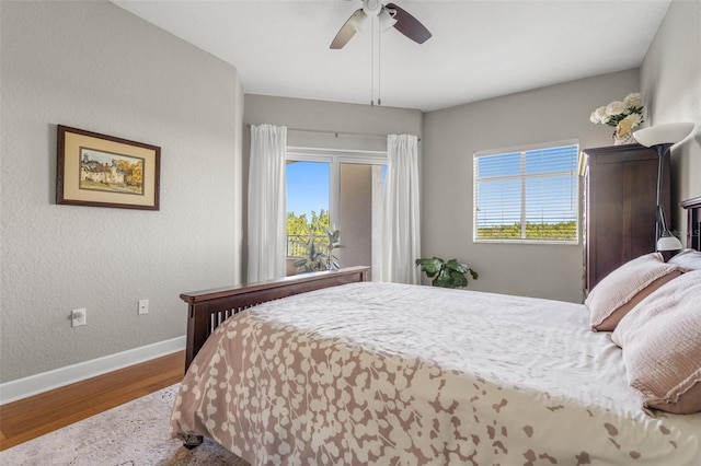 bedroom featuring hardwood / wood-style floors and ceiling fan