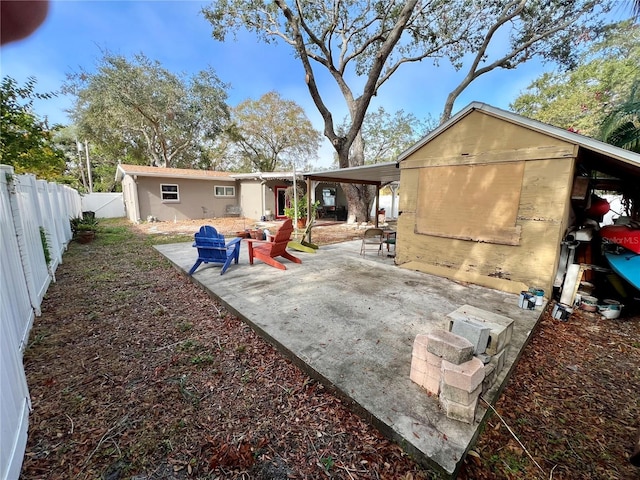 rear view of property with a patio area