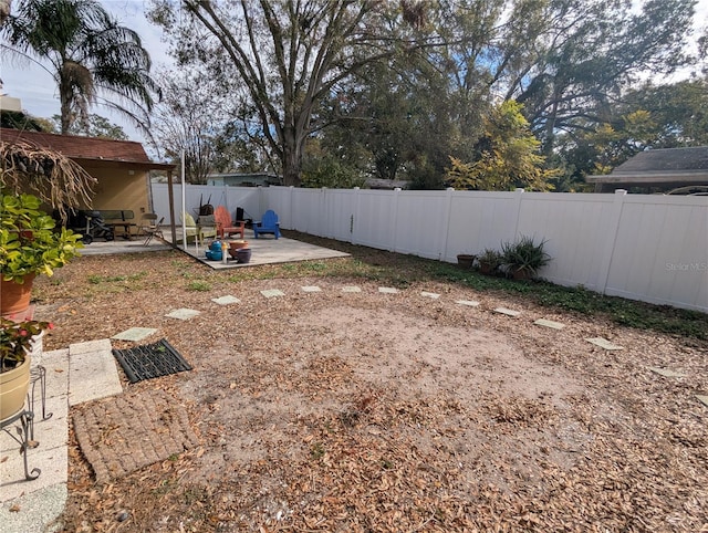 view of yard with a patio area