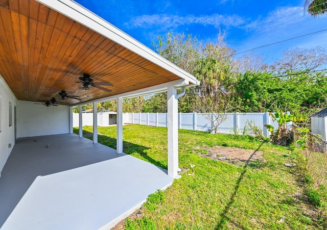 view of patio featuring ceiling fan