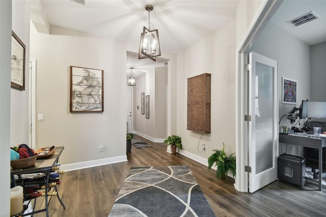 19315 Hawk Valley Dr, Tampa, FL 33647 - interior space with a chandelier and dark hardwood / wood-style floors