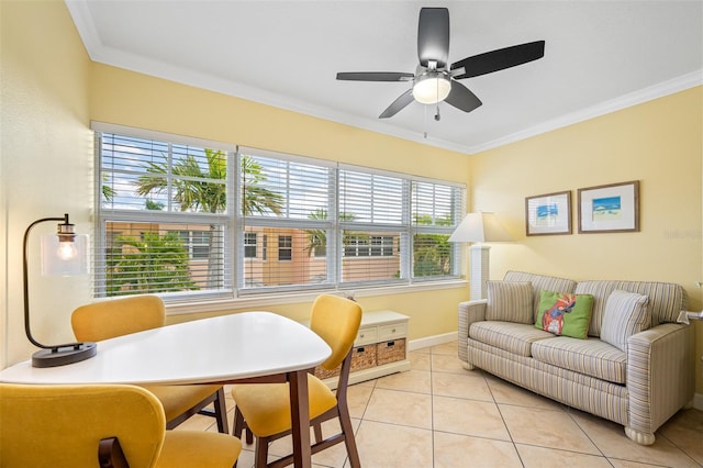 tiled living room featuring ceiling fan and crown molding