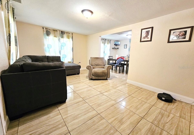 living room with a textured ceiling