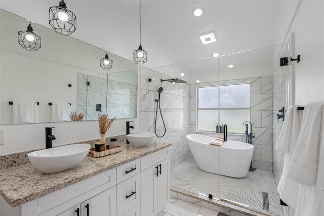 bathroom featuring vanity, shower with separate bathtub, and tile walls