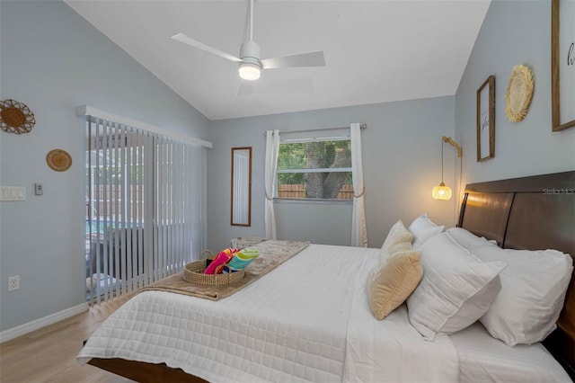 bedroom featuring light wood-type flooring, ceiling fan, and lofted ceiling