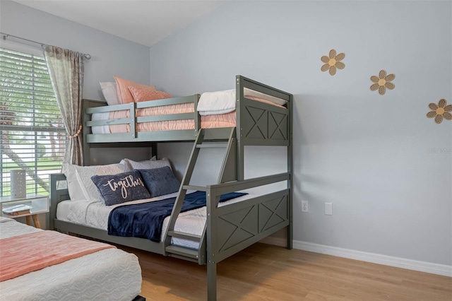 bedroom with light wood-type flooring