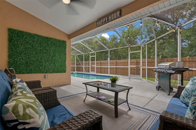 view of patio / terrace featuring a fenced in pool, glass enclosure, and grilling area