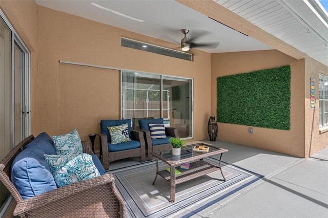 view of patio featuring outdoor lounge area and ceiling fan