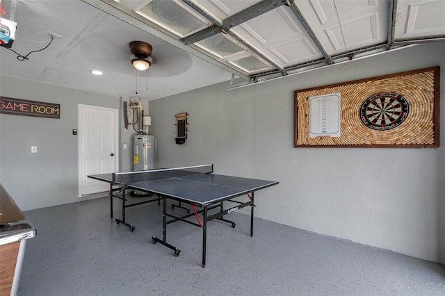 playroom featuring ceiling fan and water heater