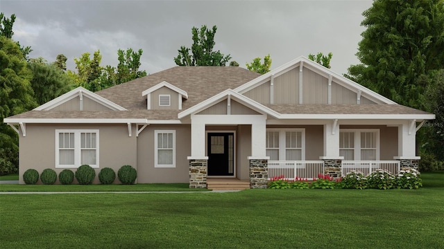 craftsman-style home featuring a porch and a front yard