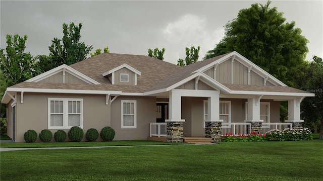 view of front of property featuring a front lawn and covered porch