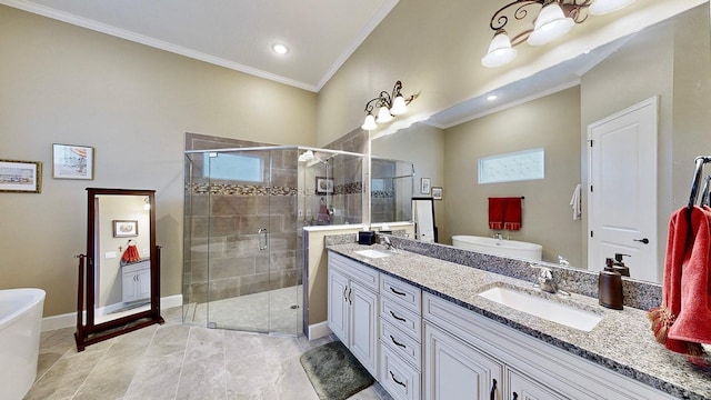 bathroom featuring crown molding, vanity, and independent shower and bath