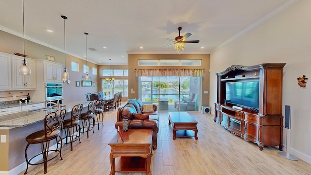 living room with ceiling fan, crown molding, sink, and light hardwood / wood-style flooring