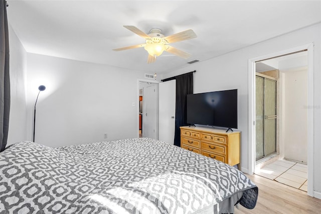 bedroom featuring ceiling fan and light wood-type flooring