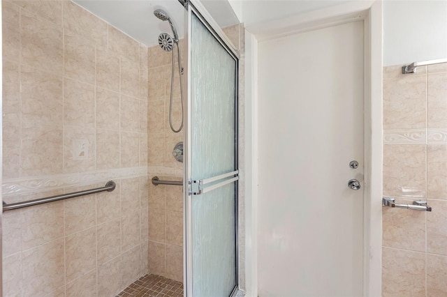 bathroom featuring an enclosed shower