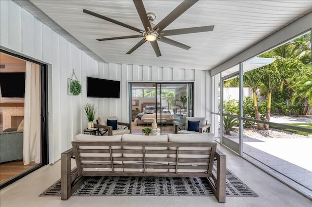 sunroom / solarium with ceiling fan