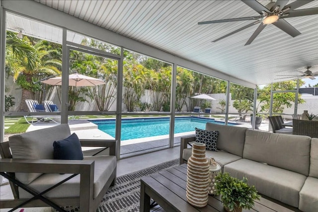 view of pool with an outdoor living space and a patio area