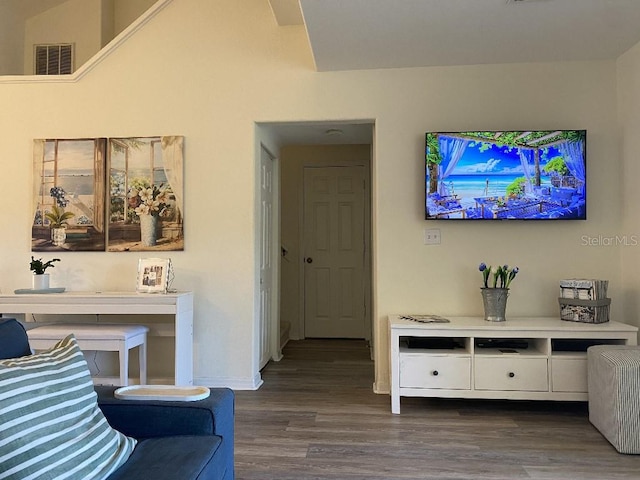 living room with dark hardwood / wood-style flooring