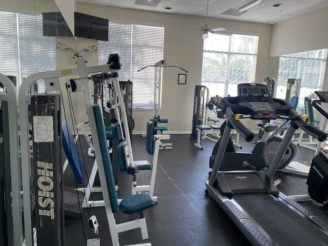 workout area featuring ceiling fan