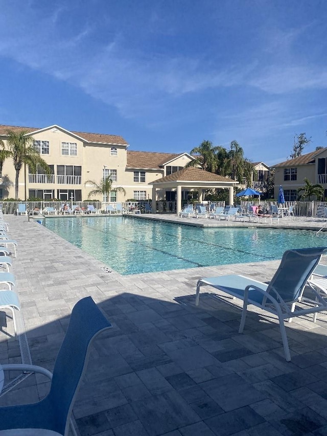 view of swimming pool featuring a patio