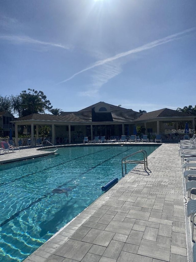 view of pool featuring a patio