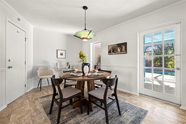 tiled dining room with crown molding