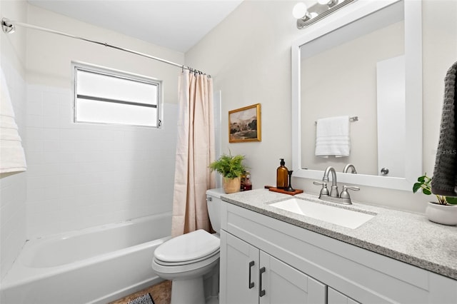 full bathroom featuring vanity, shower / tub combo, and toilet