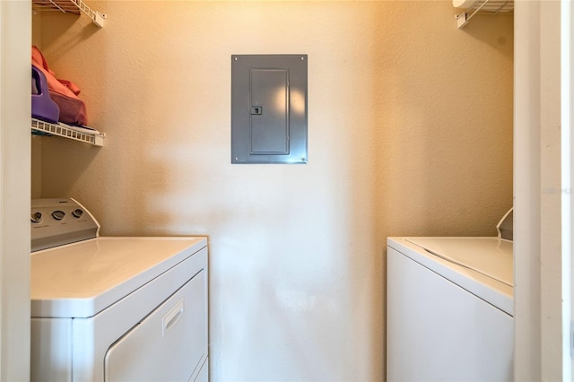 laundry area featuring washer and dryer and electric panel