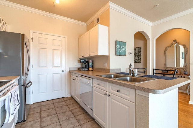 kitchen with kitchen peninsula, sink, dishwasher, white cabinets, and light tile patterned flooring