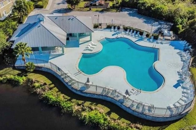 view of swimming pool featuring a patio area