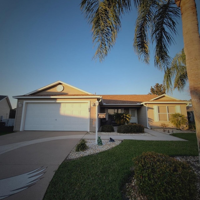 single story home with a garage