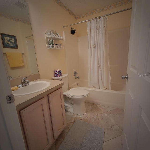 full bathroom featuring shower / tub combo, vanity, and toilet