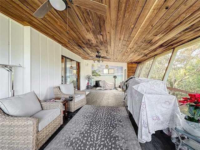 sunroom / solarium with a healthy amount of sunlight and wooden ceiling