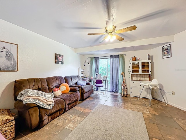 living room featuring ceiling fan