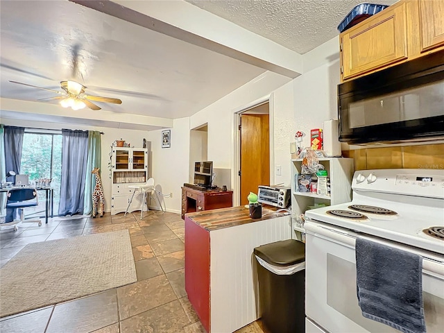 kitchen with light brown cabinets, a textured ceiling, white range with electric stovetop, and ceiling fan