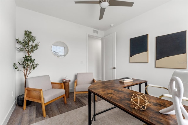 office with hardwood / wood-style floors and ceiling fan