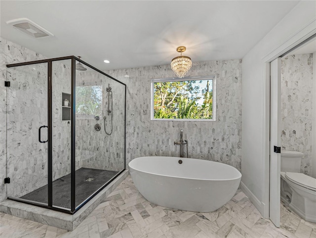 bathroom with toilet, plus walk in shower, and an inviting chandelier