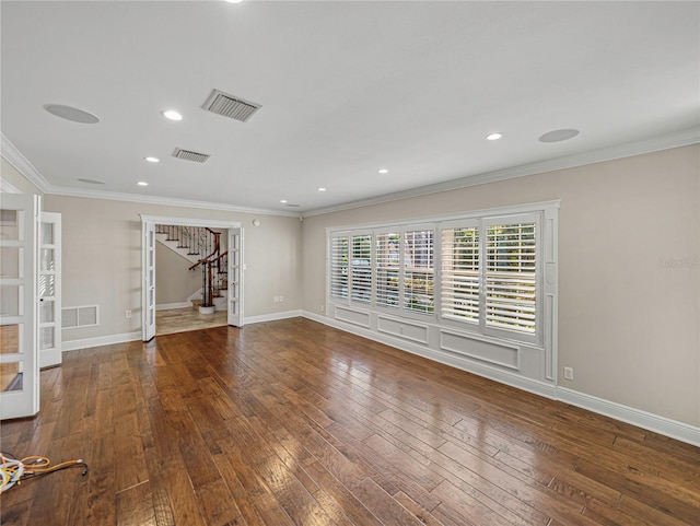 interior space featuring hardwood / wood-style floors and ornamental molding