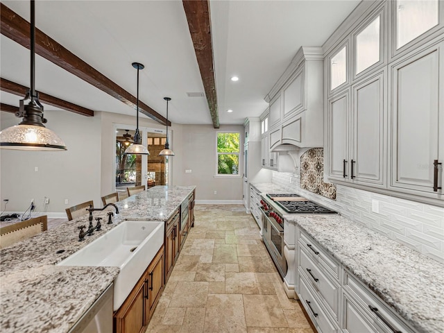 kitchen featuring beamed ceiling, white cabinets, and tasteful backsplash