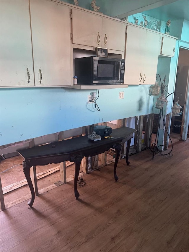 kitchen with hardwood / wood-style floors