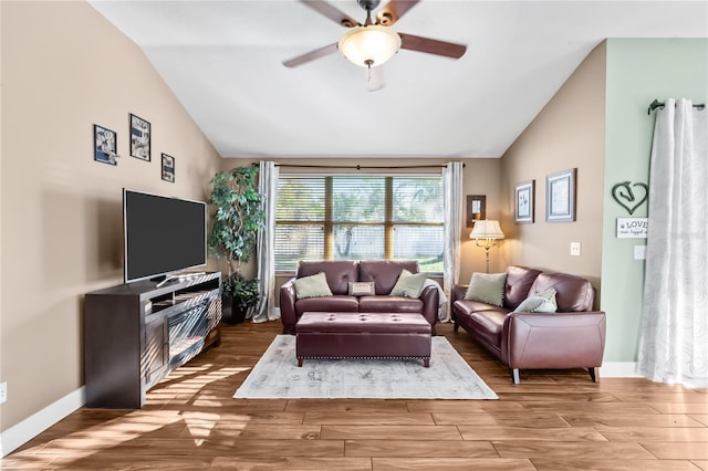 living room with vaulted ceiling and ceiling fan