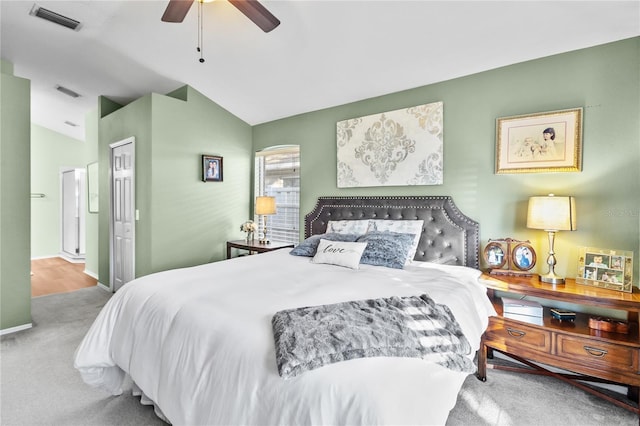 bedroom featuring carpet flooring, ceiling fan, a closet, and lofted ceiling