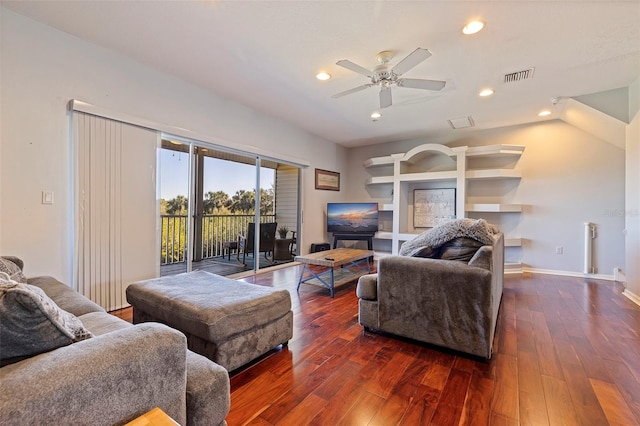 living room featuring ceiling fan, dark hardwood / wood-style flooring, and lofted ceiling