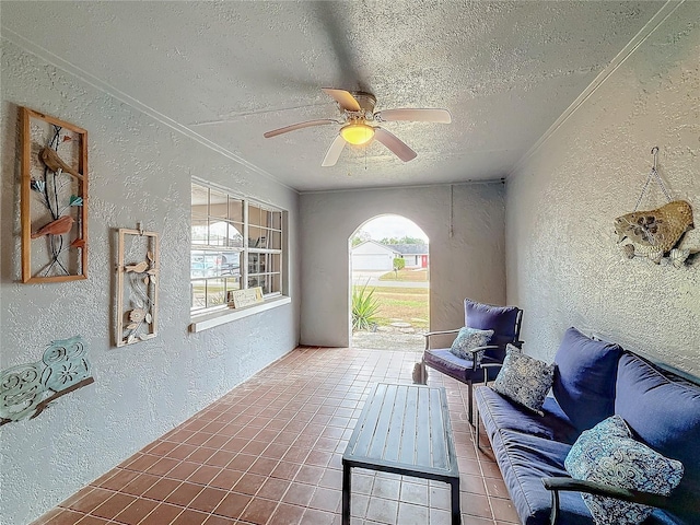 interior space with outdoor lounge area and ceiling fan