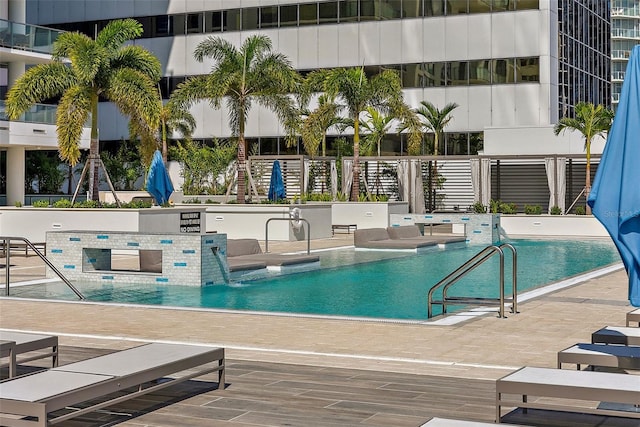 view of swimming pool featuring a patio